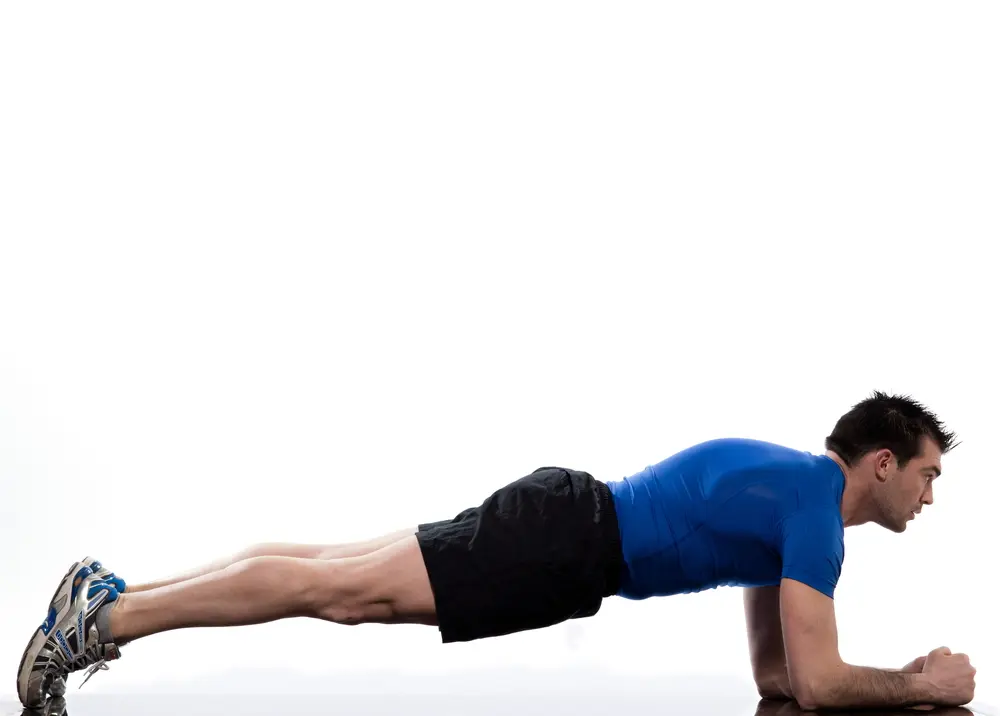 man on Abdominals workout Basic Plank posture on white background - plank poses
